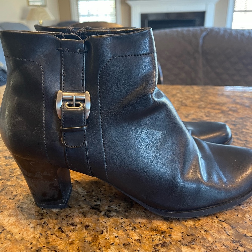 Black heeled boots by Covington.  2.5” heels. Gently worn